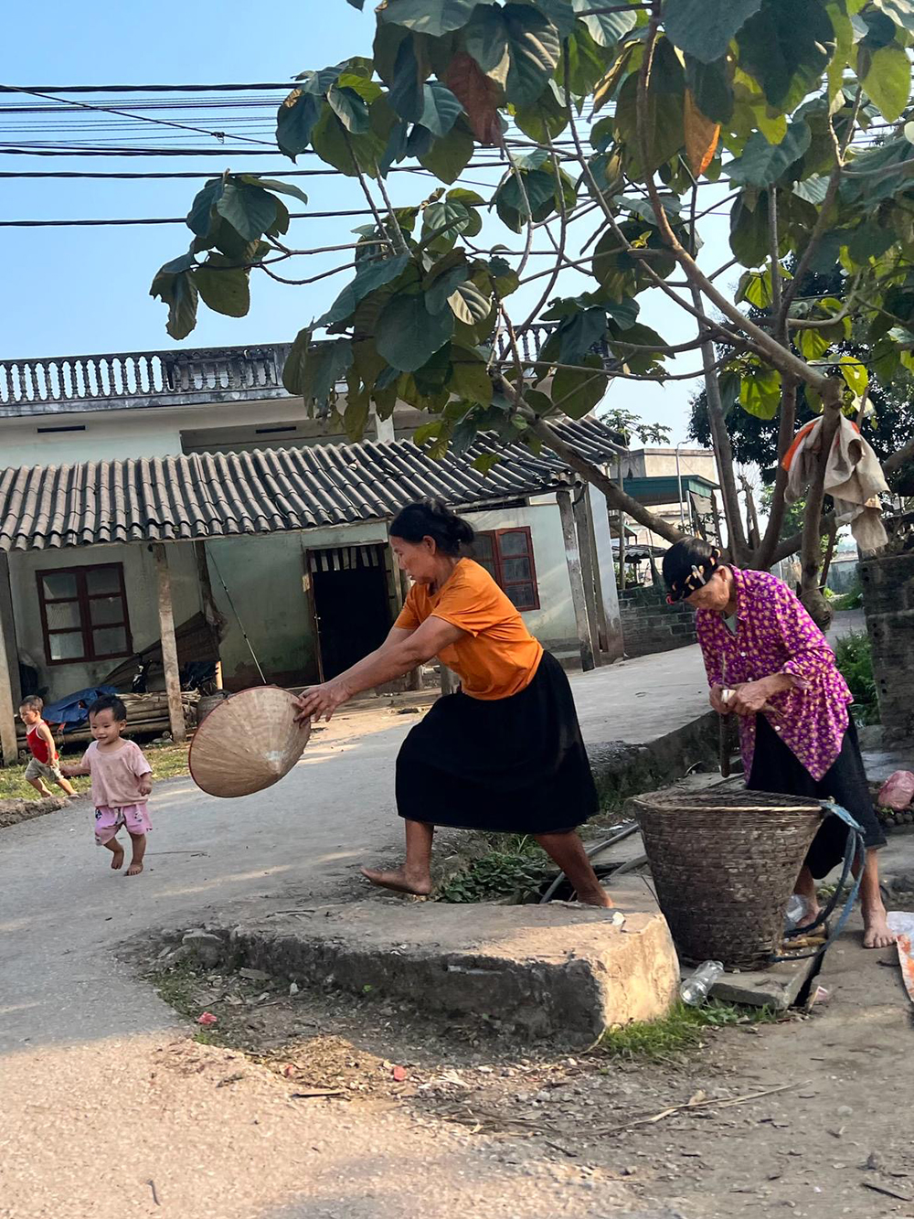 woman chasing her hat