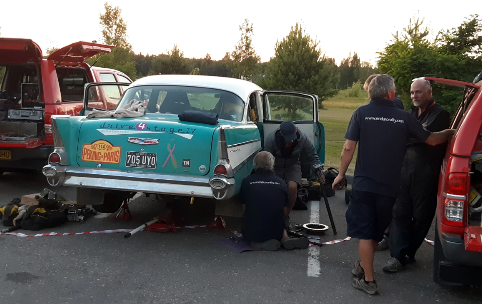 Chevy, jacked up for repairs