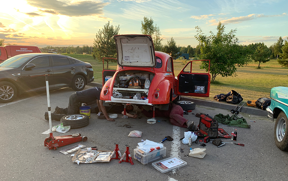 Another team's car getting repaired