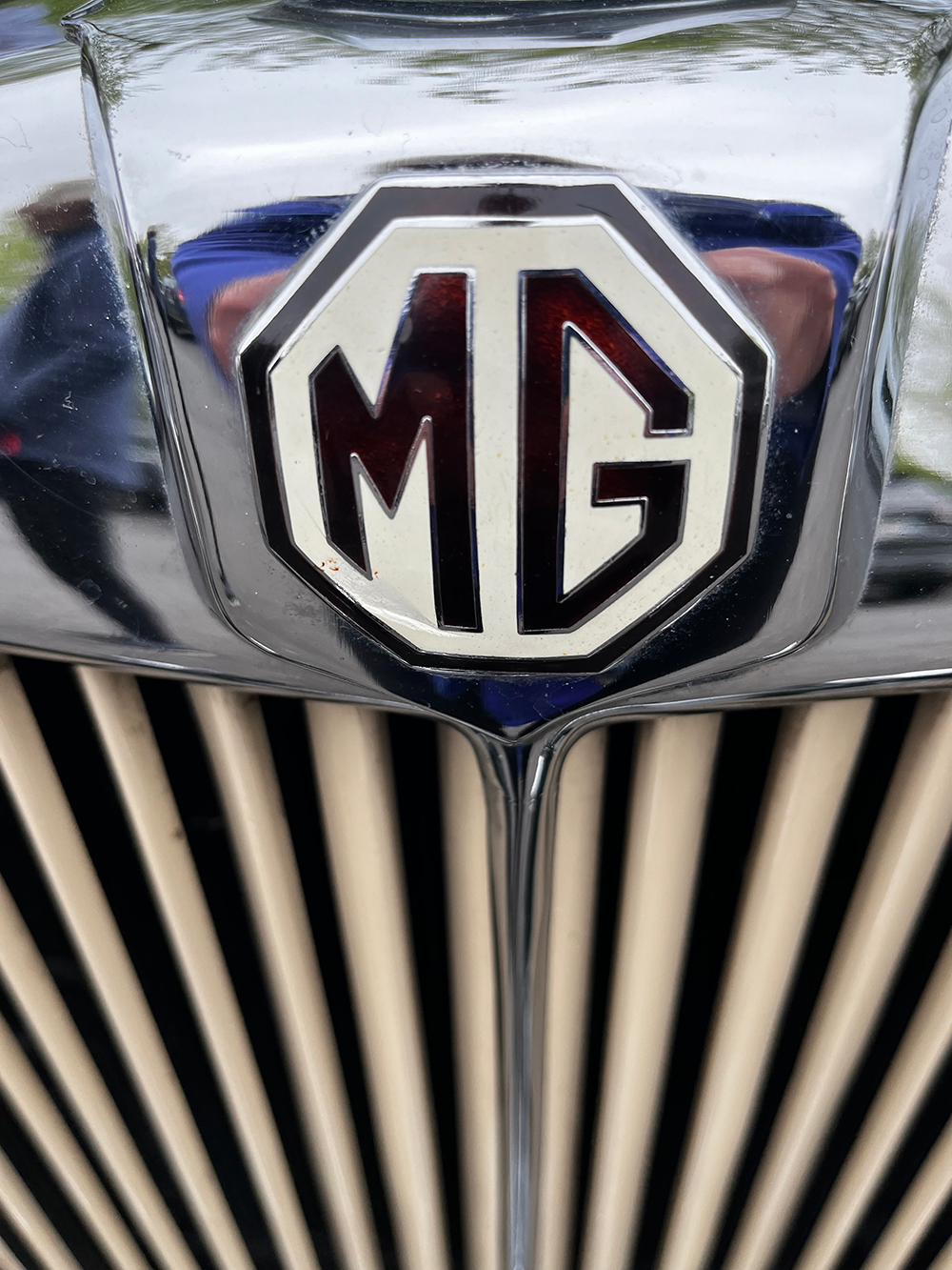 MG